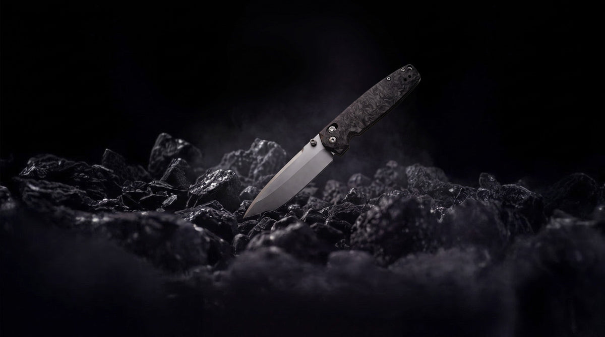 ONYX Everyday Folder resting on black coal